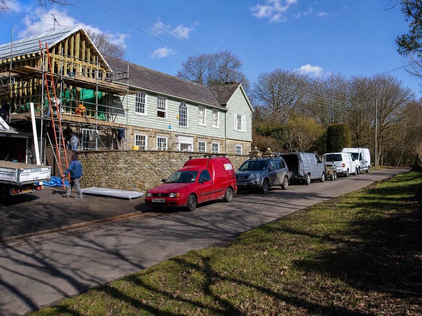 Building team and work vehicles at a large timber extension